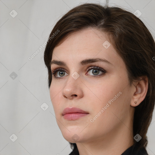 Neutral white young-adult female with short  brown hair and brown eyes