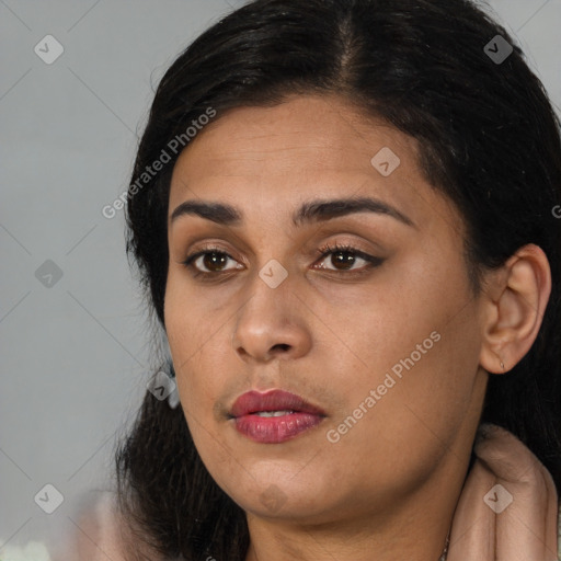 Joyful asian young-adult female with long  black hair and brown eyes