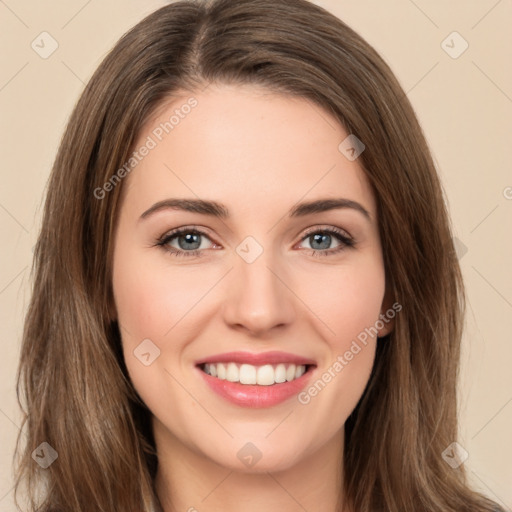 Joyful white young-adult female with long  brown hair and green eyes