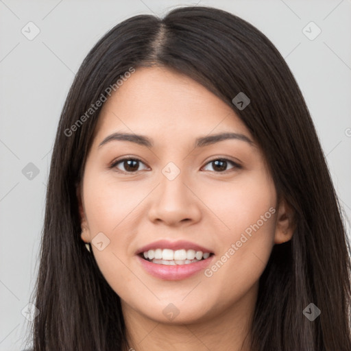 Joyful latino young-adult female with long  brown hair and brown eyes