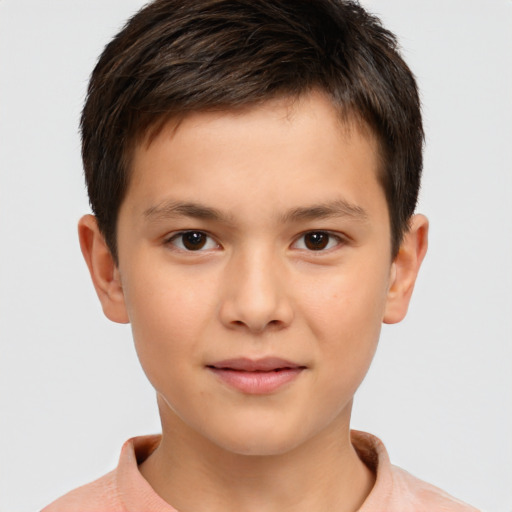 Joyful white child male with short  brown hair and brown eyes