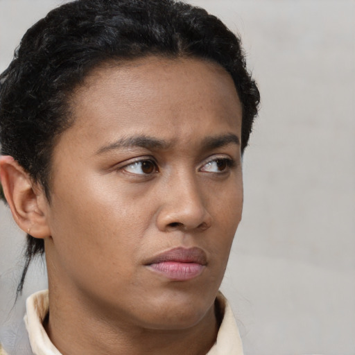 Neutral black young-adult male with short  brown hair and brown eyes