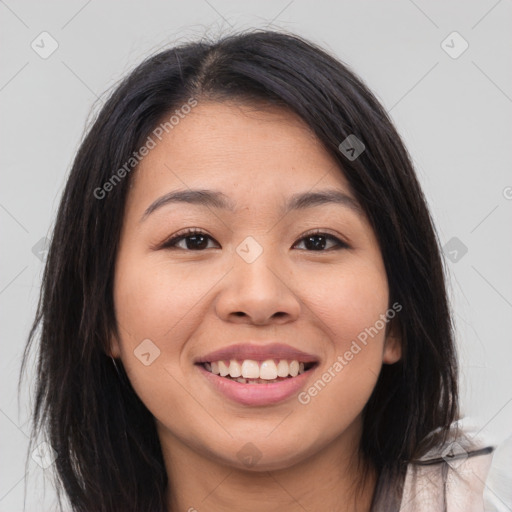 Joyful asian young-adult female with long  brown hair and brown eyes