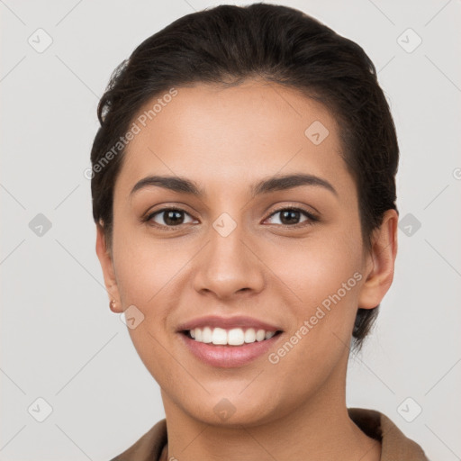 Joyful white young-adult female with short  brown hair and brown eyes