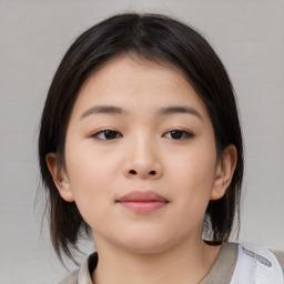 Neutral asian young-adult female with medium  brown hair and brown eyes