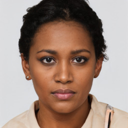 Neutral black young-adult female with short  black hair and brown eyes