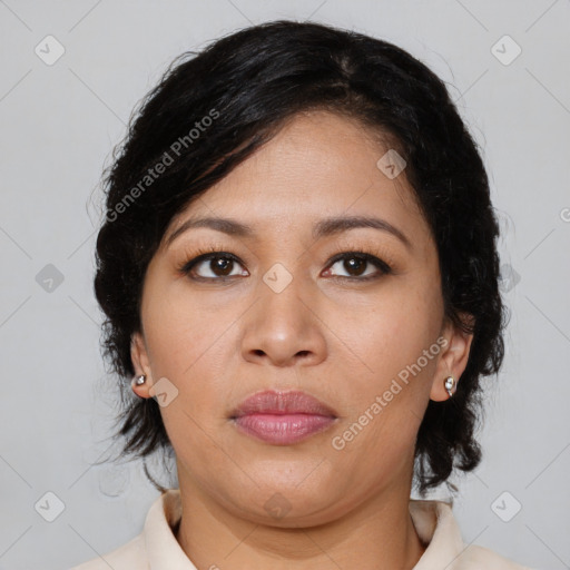 Joyful latino young-adult female with medium  brown hair and brown eyes