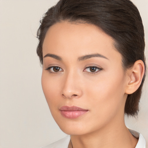 Neutral white young-adult female with medium  brown hair and brown eyes