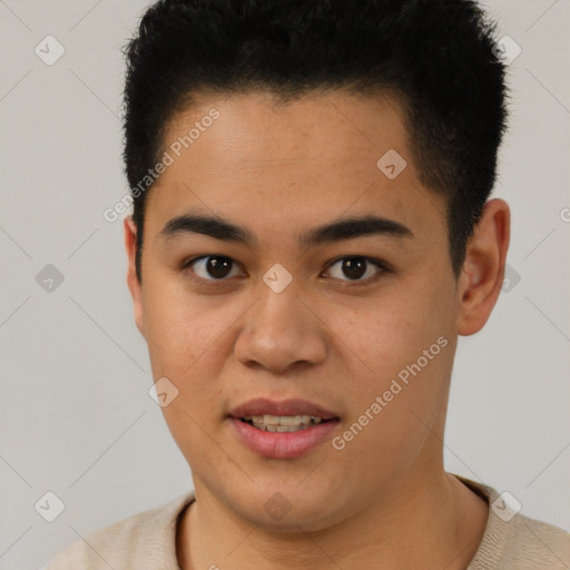 Joyful latino young-adult male with short  brown hair and brown eyes