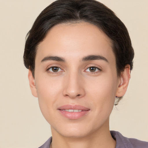 Joyful white young-adult female with medium  brown hair and brown eyes