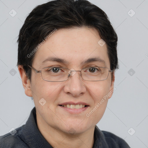 Joyful white adult female with short  brown hair and brown eyes