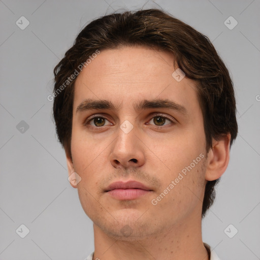 Neutral white young-adult male with short  brown hair and brown eyes