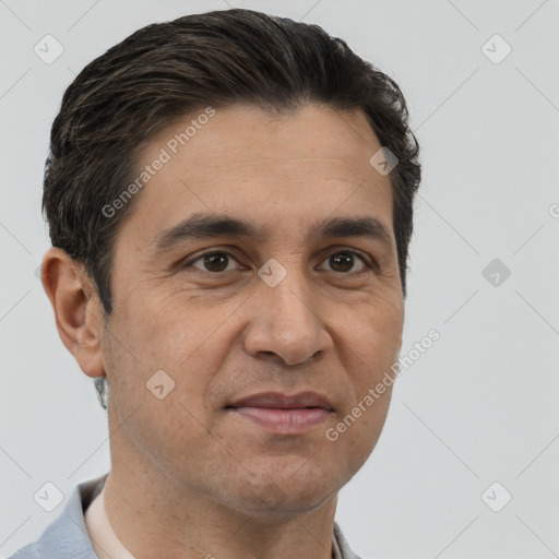 Joyful white adult male with short  brown hair and brown eyes