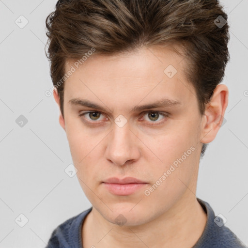 Neutral white young-adult male with short  brown hair and grey eyes