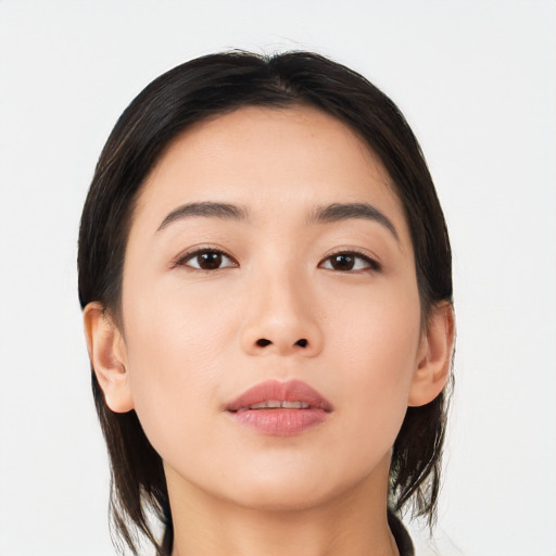 Neutral asian young-adult female with medium  brown hair and brown eyes