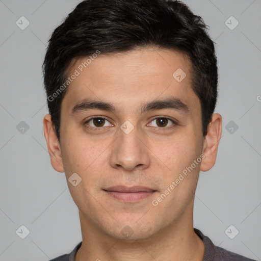 Joyful white young-adult male with short  black hair and brown eyes