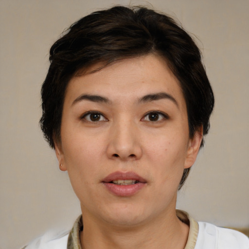 Neutral white young-adult female with short  brown hair and brown eyes