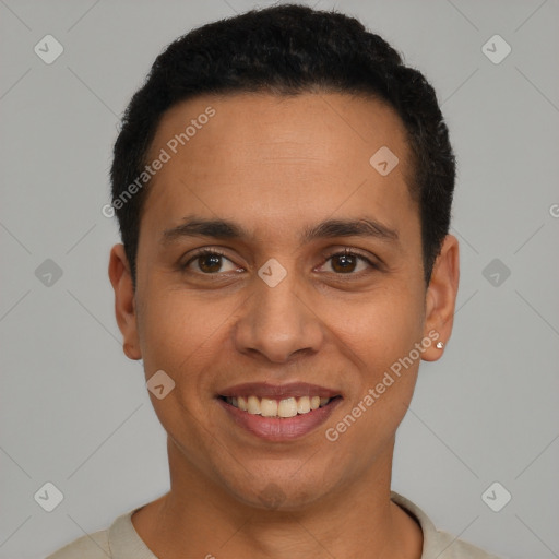 Joyful latino young-adult male with short  black hair and brown eyes