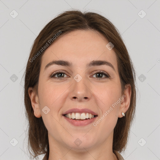 Joyful white young-adult female with medium  brown hair and grey eyes