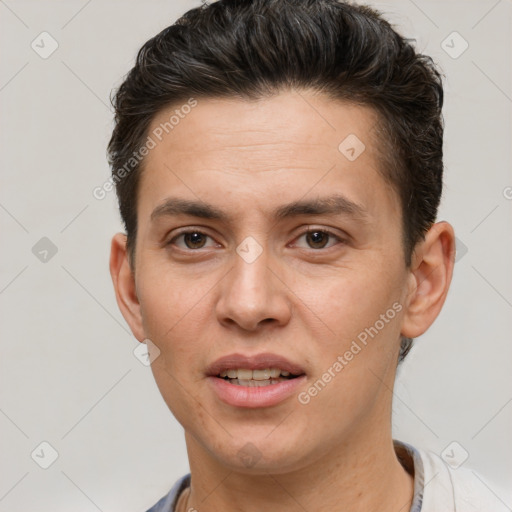 Joyful white adult male with short  brown hair and brown eyes