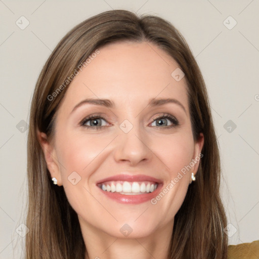 Joyful white young-adult female with long  brown hair and grey eyes