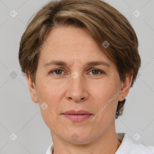 Joyful white adult female with short  brown hair and grey eyes