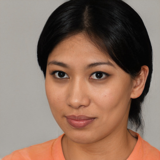 Neutral asian young-adult female with medium  black hair and brown eyes