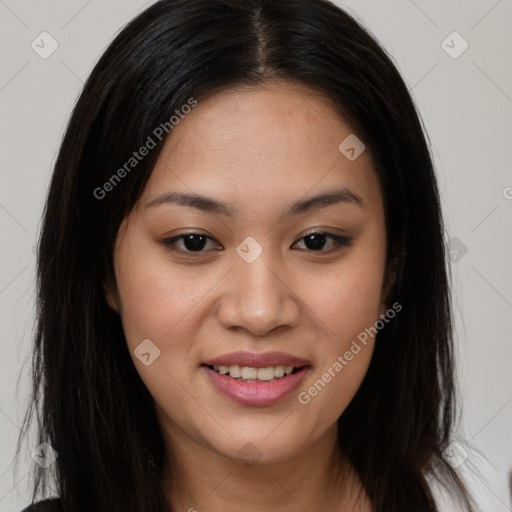 Joyful asian young-adult female with long  brown hair and brown eyes