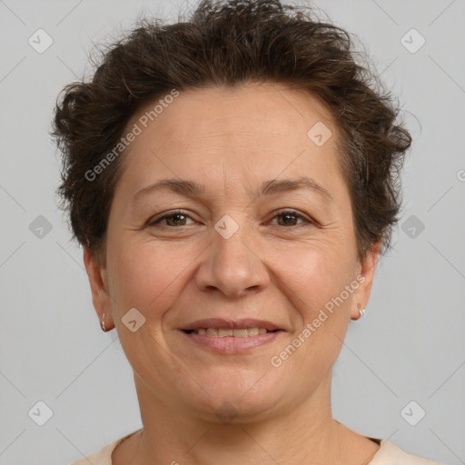 Joyful white adult female with short  brown hair and brown eyes