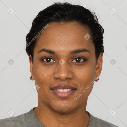 Joyful black young-adult female with short  black hair and brown eyes