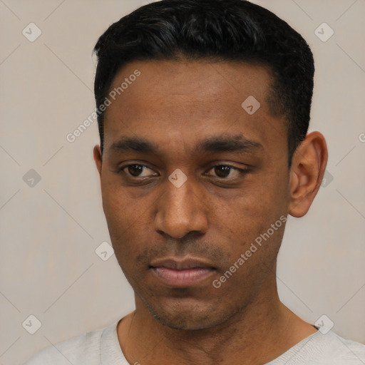 Neutral black young-adult male with short  black hair and brown eyes