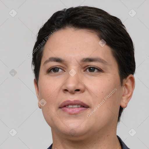 Joyful white adult female with short  brown hair and brown eyes