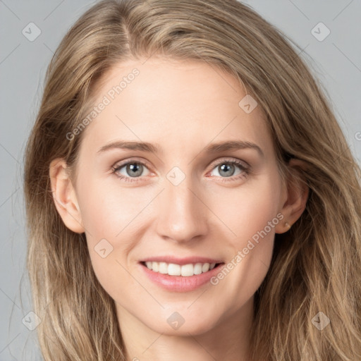 Joyful white young-adult female with long  brown hair and grey eyes