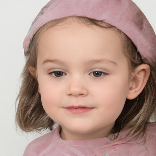 Joyful white child female with medium  brown hair and grey eyes