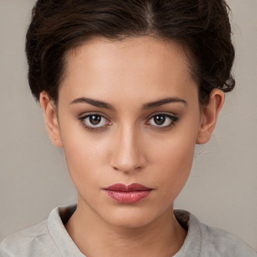 Neutral white young-adult female with short  brown hair and brown eyes