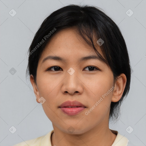 Joyful asian young-adult female with medium  brown hair and brown eyes