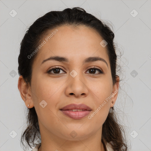 Joyful latino young-adult female with medium  brown hair and brown eyes