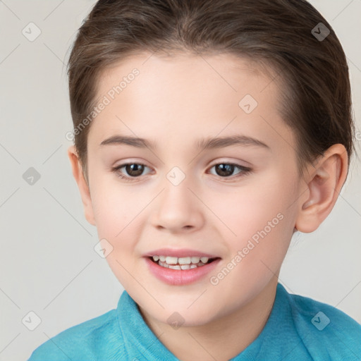 Joyful white child female with short  brown hair and brown eyes