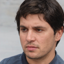Neutral white adult male with short  brown hair and brown eyes