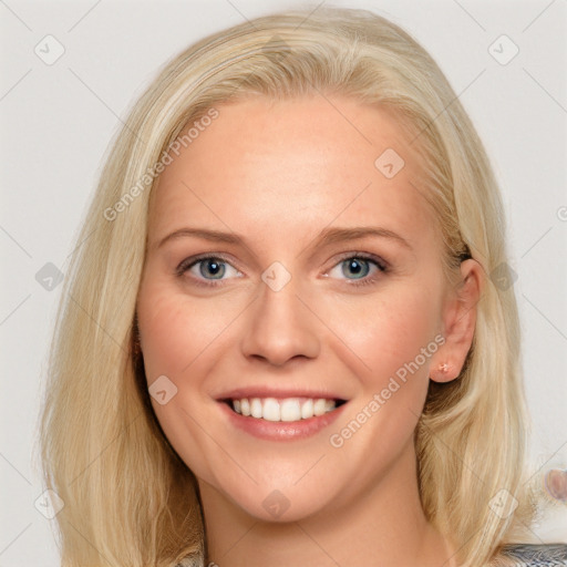 Joyful white young-adult female with medium  brown hair and blue eyes