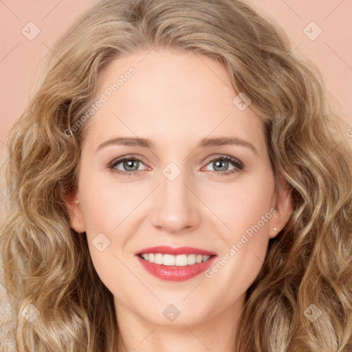 Joyful white young-adult female with long  brown hair and green eyes