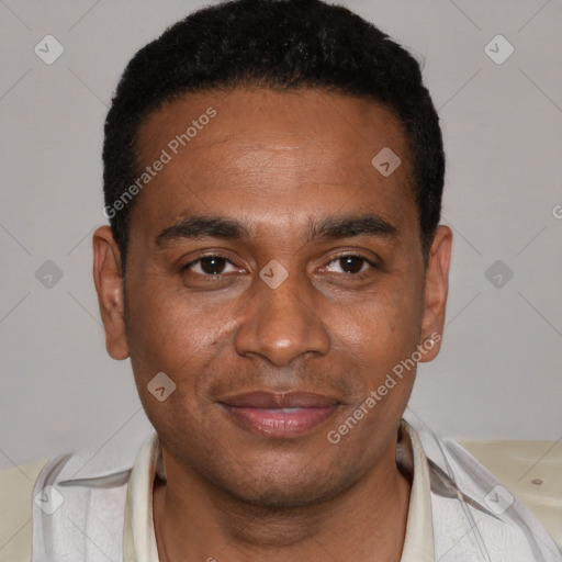 Joyful black young-adult male with short  black hair and brown eyes