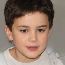 Joyful white child male with short  brown hair and brown eyes