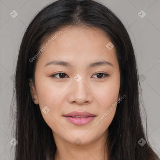 Joyful asian young-adult female with long  brown hair and brown eyes