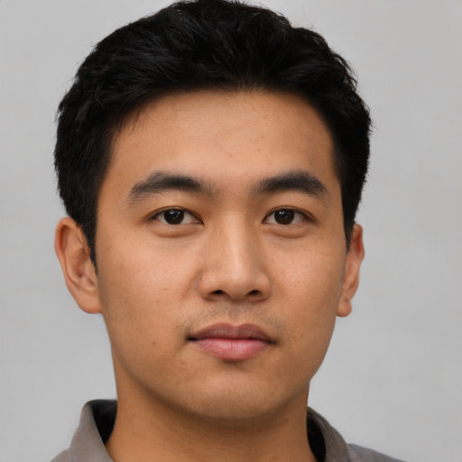 Neutral asian young-adult male with short  black hair and brown eyes