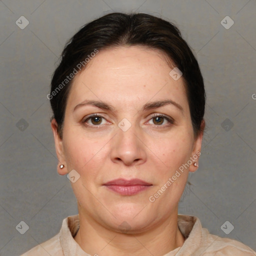 Joyful white adult female with short  brown hair and brown eyes