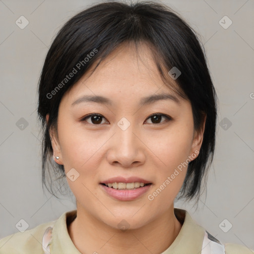 Joyful asian young-adult female with medium  brown hair and brown eyes