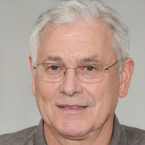 Neutral white middle-aged male with short  gray hair and blue eyes