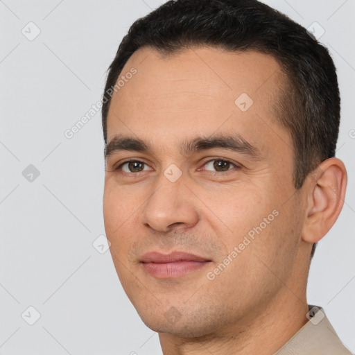 Joyful white young-adult male with short  brown hair and brown eyes