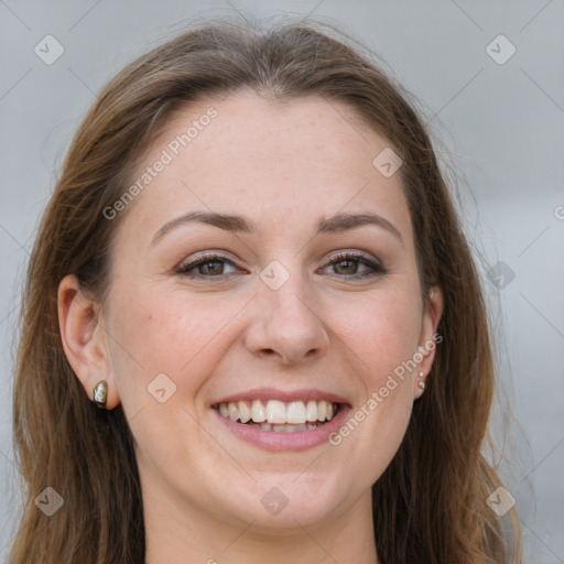 Joyful white young-adult female with long  brown hair and grey eyes